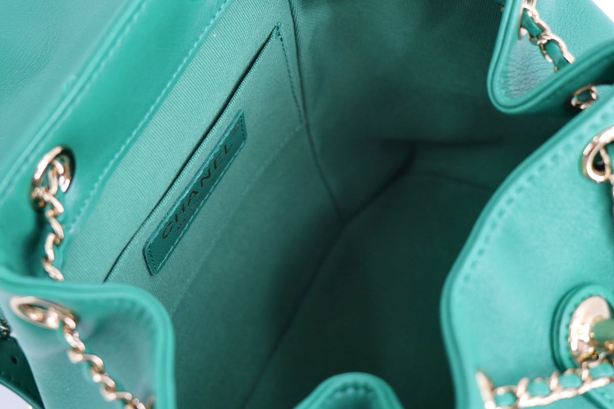 CHANEL Duma Backpack, Quilted Glazed Aged Calfskin in Green from 23C Collection
